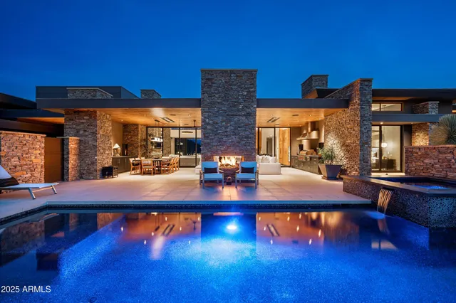 a living room with furniture fireplace and a flat screen tv