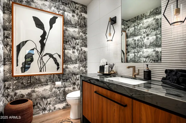 a view of pool table and chairs in patio