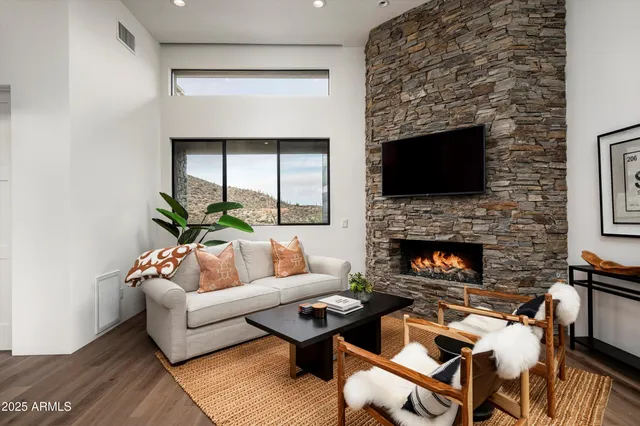a view of balcony with wooden floor and a palm tree
