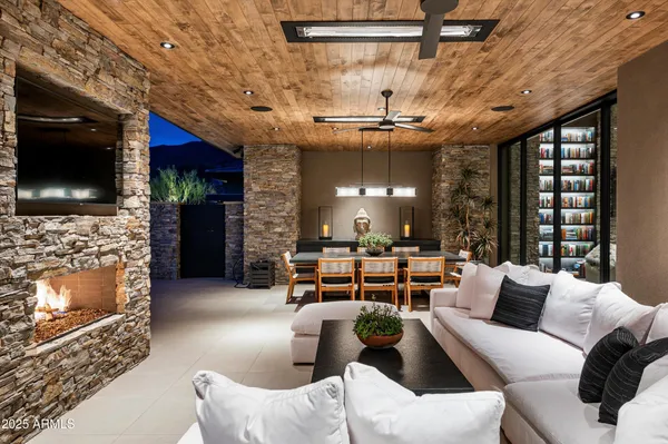 an aerial view of house with mountain view