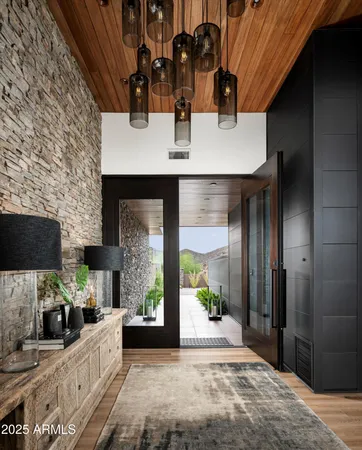 a kitchen with a sink and a refrigerator