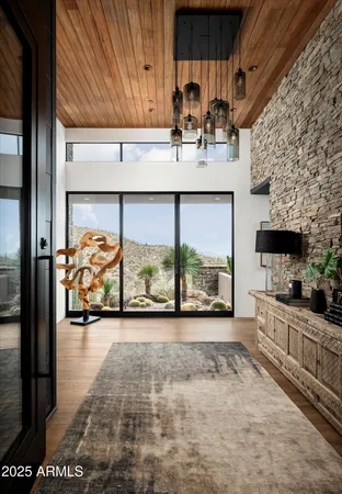 a kitchen with stainless steel appliances a sink and a microwave