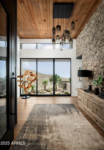 a kitchen with stainless steel appliances a sink and a microwave