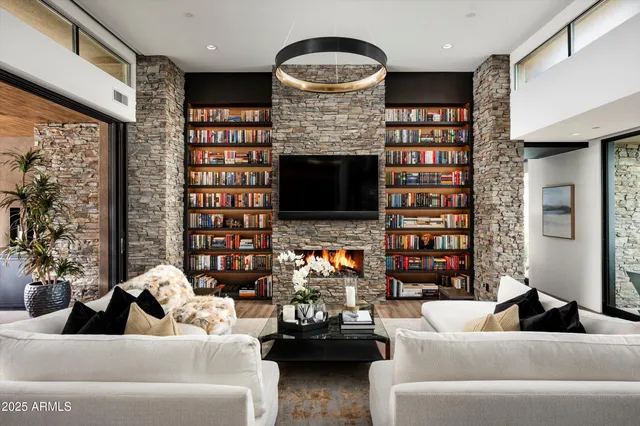 a kitchen with stainless steel appliances a stove sink microwave and cabinets