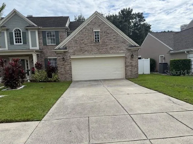 a front view of house with yard