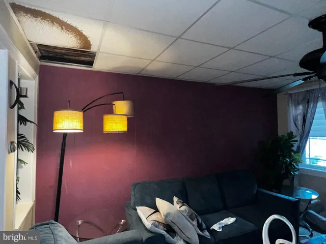 a kitchen with a refrigerator a stove a sink and a stove