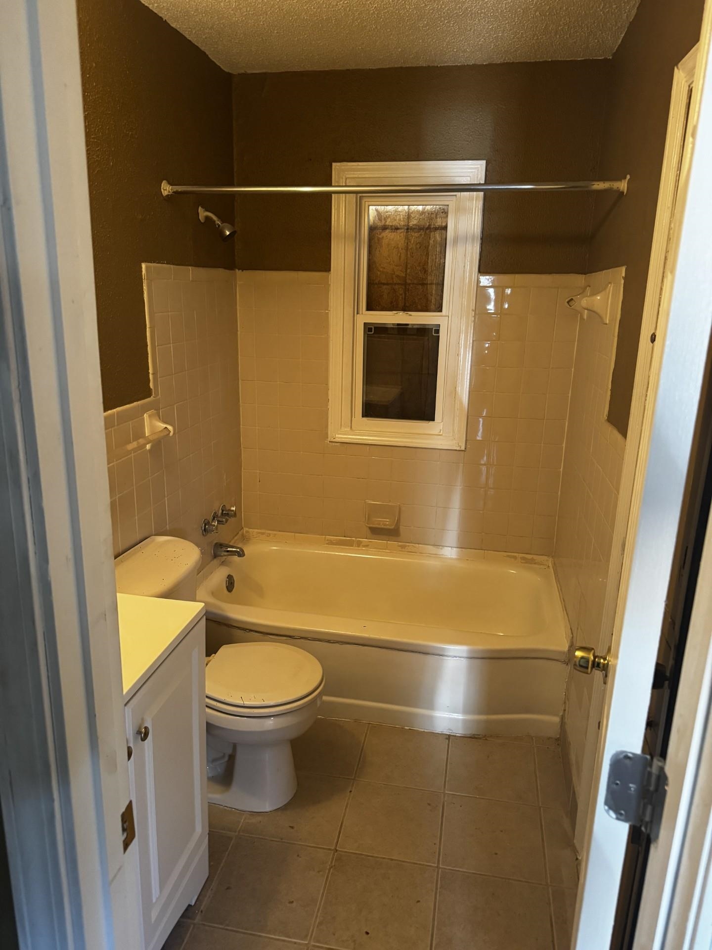 3271 Seminole Road Memphis, TN 38111 - Photo 3 of 8 a bathroom with a toilet and a shower