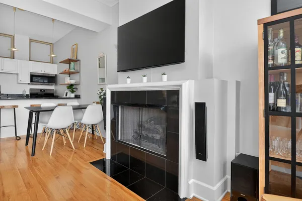 a living room with furniture and a table