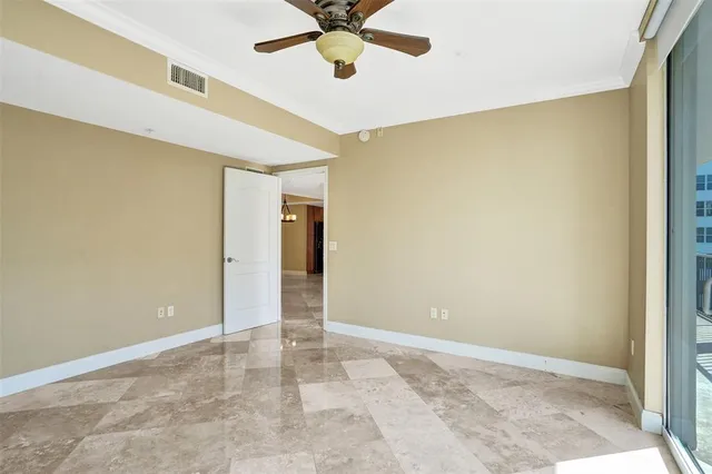 a view of balcony with wooden floor and fence