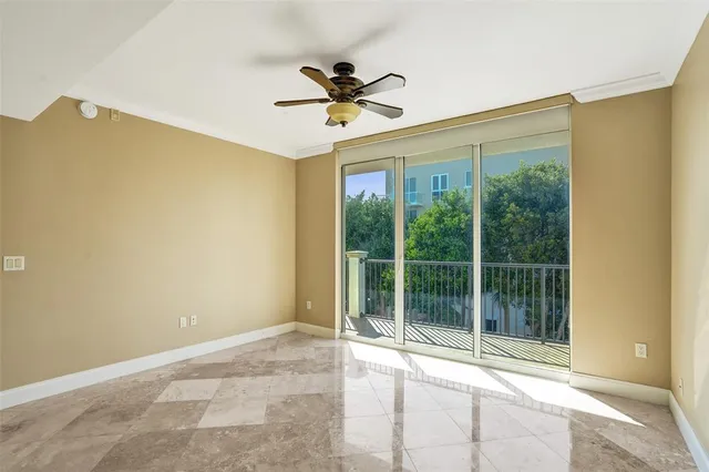 a view of a closet with wooden floor