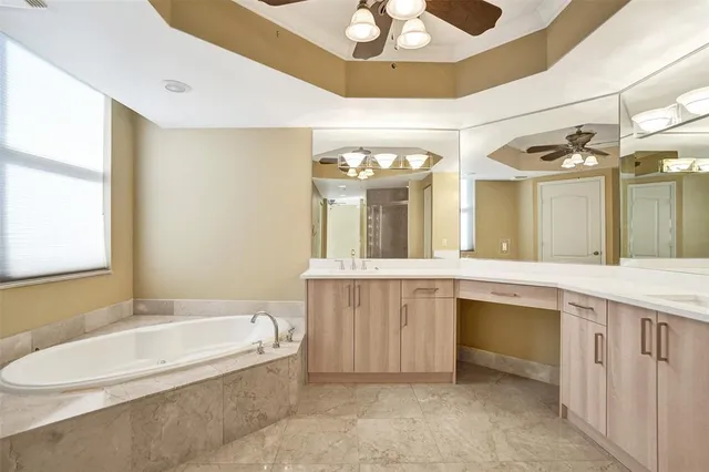 a view of building with yard and large trees