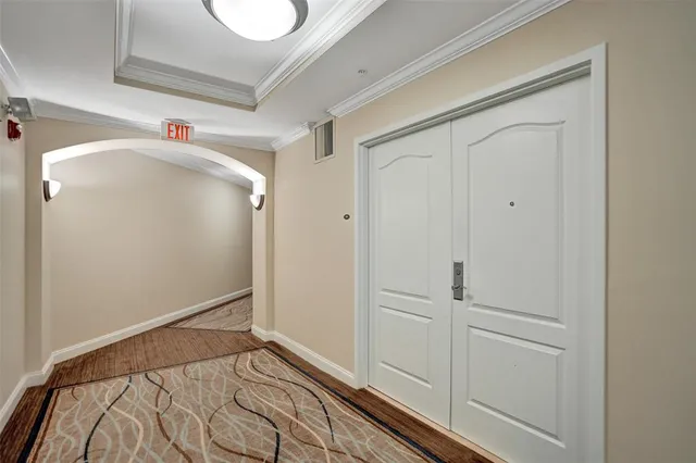 a view of a house with pool fire pit and chairs in patio