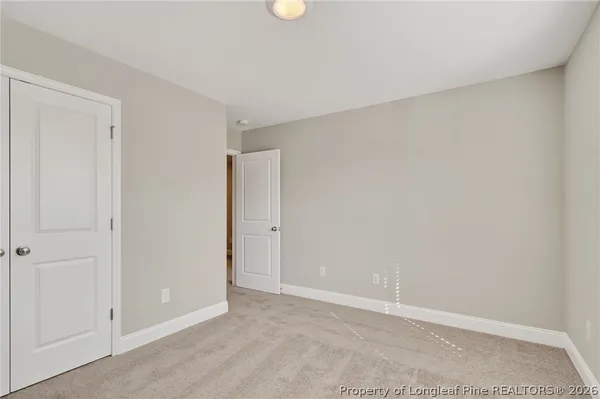 an empty room with closet