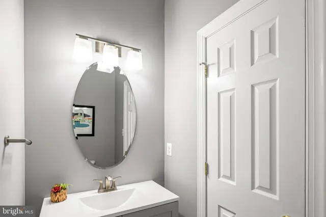 a bedroom with a bed couch and window