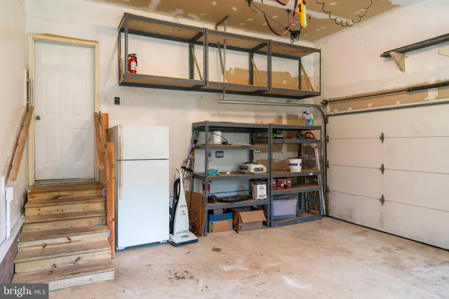 a house with a big yard and large trees