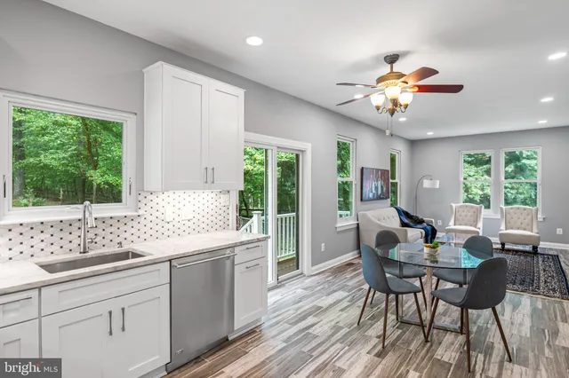 a view of a dining room with furniture window and outside view