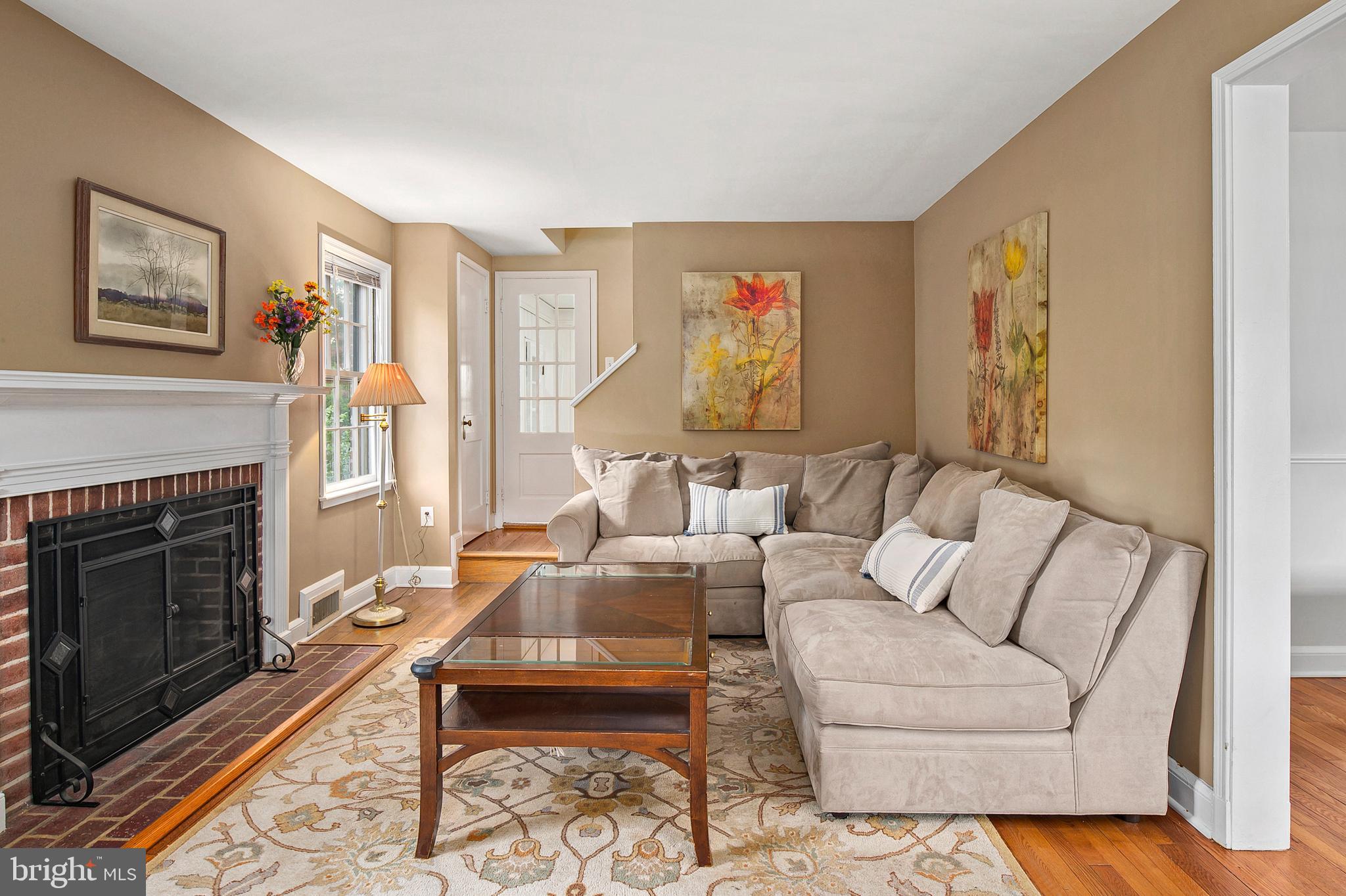 916 Adana Road Pikesville, MD 21208 - Photo 4 of 28 Tastefully finished living room with a fireplace