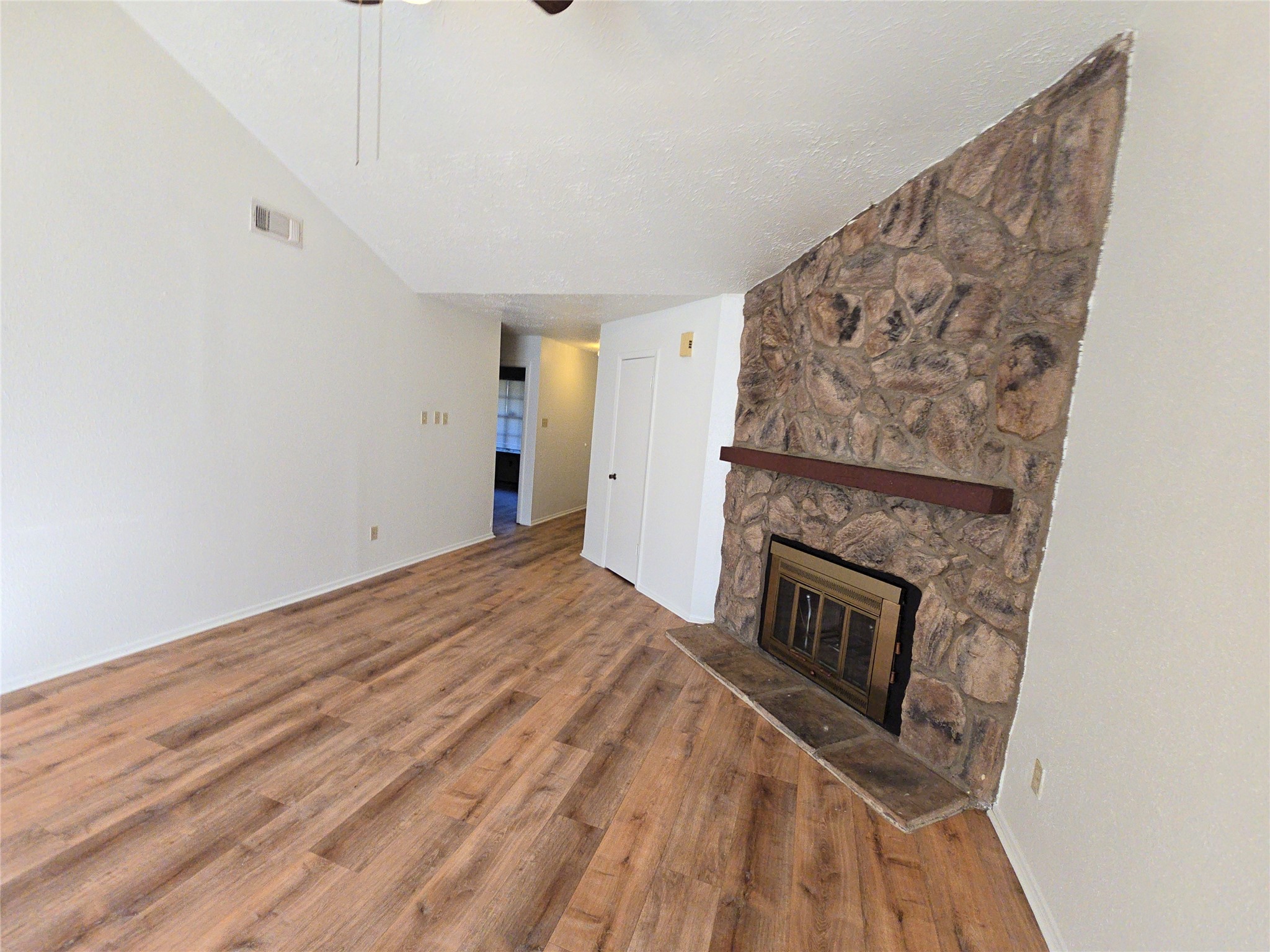 10906 Maple Rock Drive Humble, TX 77396 - Photo 13 of 27 a view of a livingroom with a fireplace