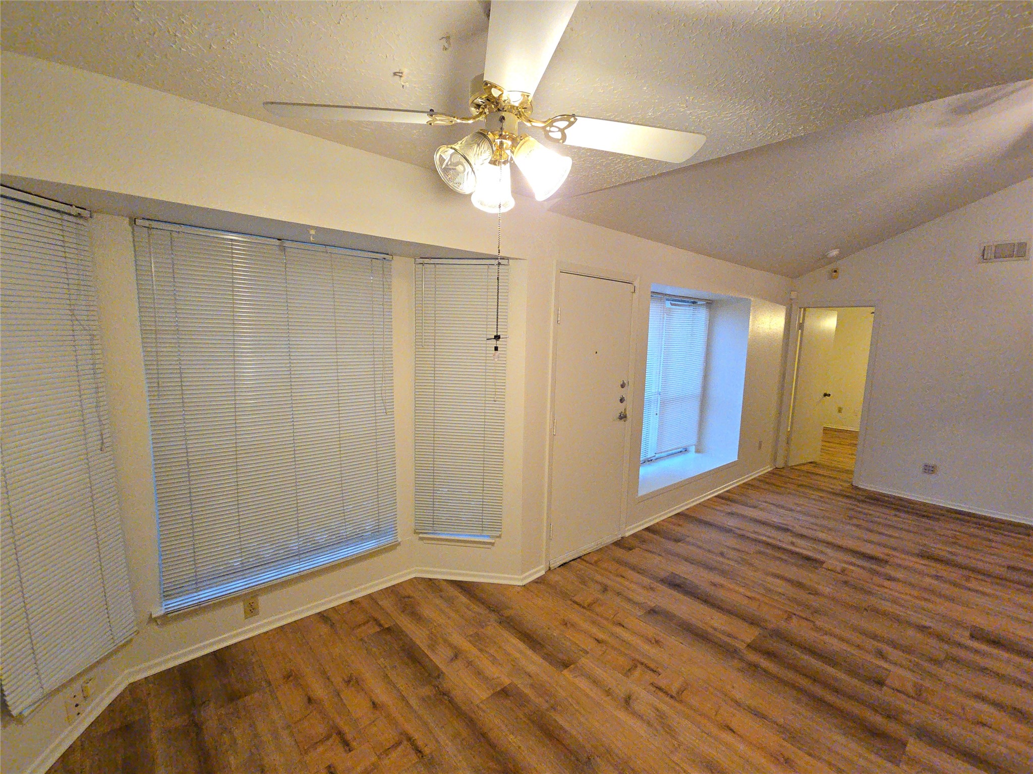 10906 Maple Rock Drive Humble, TX 77396 - Photo 4 of 27 a view of an empty room with a window