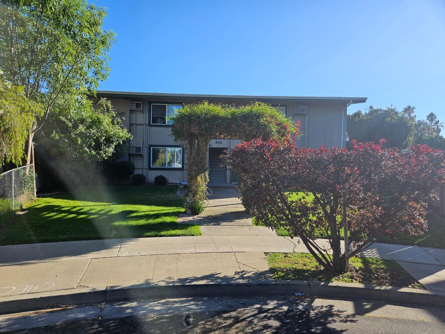 616 Gamma Court Campbell, CA 95008 - Photo 1 of 23 a front view of a house with a yard