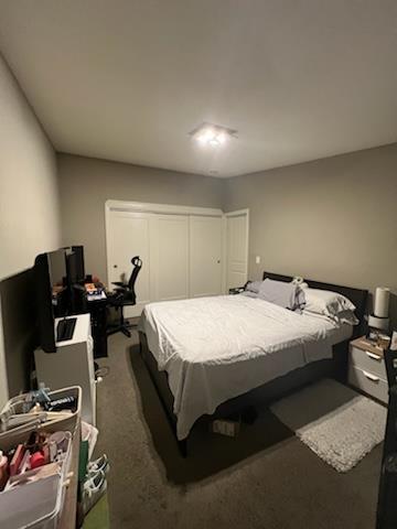 616 Gamma Court Campbell, CA 95008 - Photo 11 of 23 a bedroom with bed and a computer on a desk next to a window