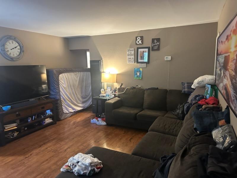 616 Gamma Court Campbell, CA 95008 - Photo 13 of 23 a living room with furniture and a flat screen tv