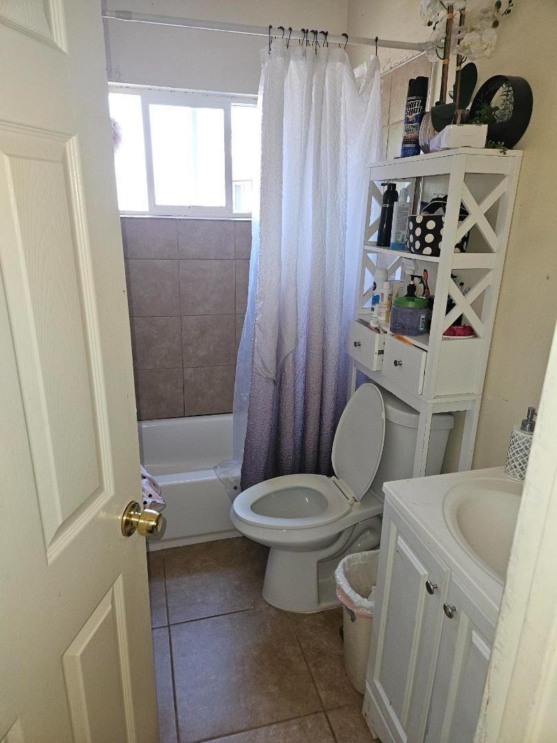 616 Gamma Court Campbell, CA 95008 - Photo 14 of 23 a bathroom with a toilet a sink and a shower