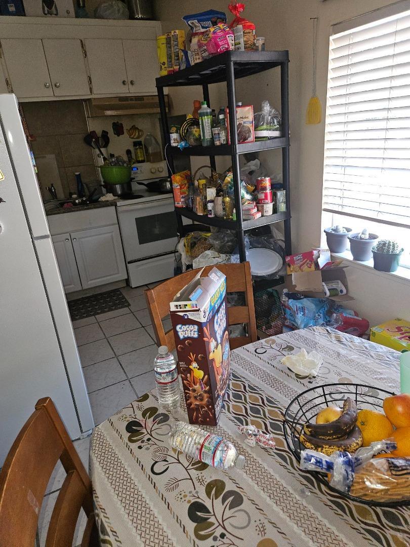 616 Gamma Court Campbell, CA 95008 - Photo 17 of 23 a view of a dining room with furniture window and wooden floor