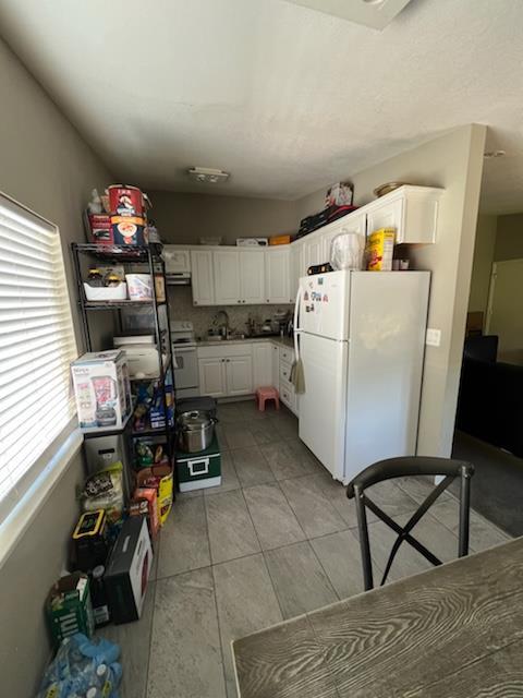 616 Gamma Court Campbell, CA 95008 - Photo 19 of 23 a storage room with washer and dryer