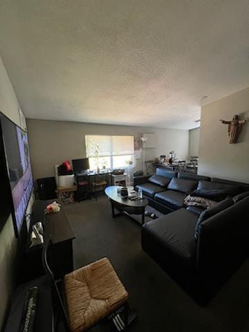 616 Gamma Court Campbell, CA 95008 - Photo 23 of 23 a living room with furniture and a flat screen tv