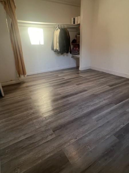 616 Gamma Court Campbell, CA 95008 - Photo 7 of 23 a view of a car garage with a hardwood