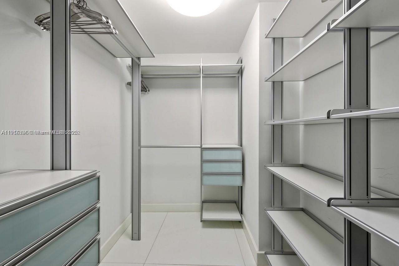 1040 Biscayne Boulevard, Unit 4403 Miami, FL 33132 - Photo 25 of 31 a view of walk in closet
