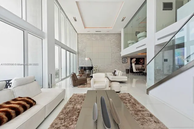 a living room with furniture and a couch