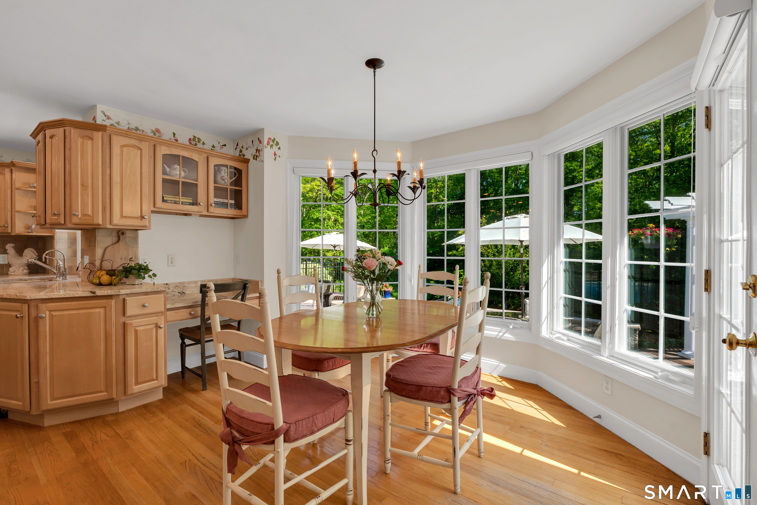 21 Stone Wall Road Salem, CT 06420 - Photo 11 of 38 a dining room with furniture window and wooden floor