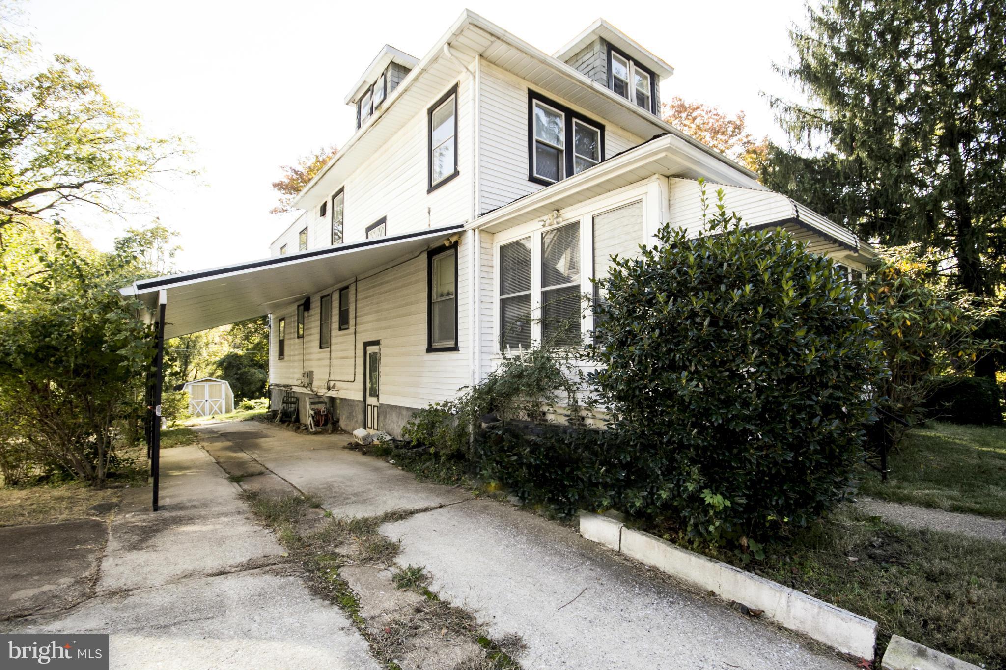 1803 Chelsea Road Baltimore, MD 21216 - Photo 2 of 30 a view of a house with a patio