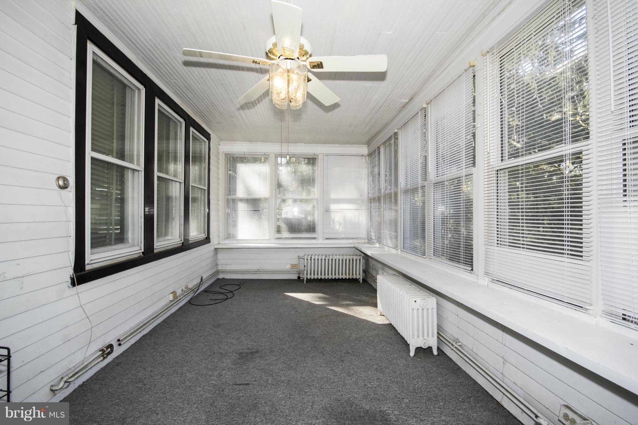 1803 Chelsea Road Baltimore, MD 21216 - Photo 3 of 30 a view of an entryway with chandelier