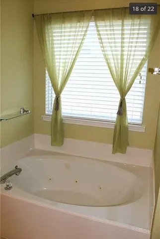 a bathroom with a bathtub