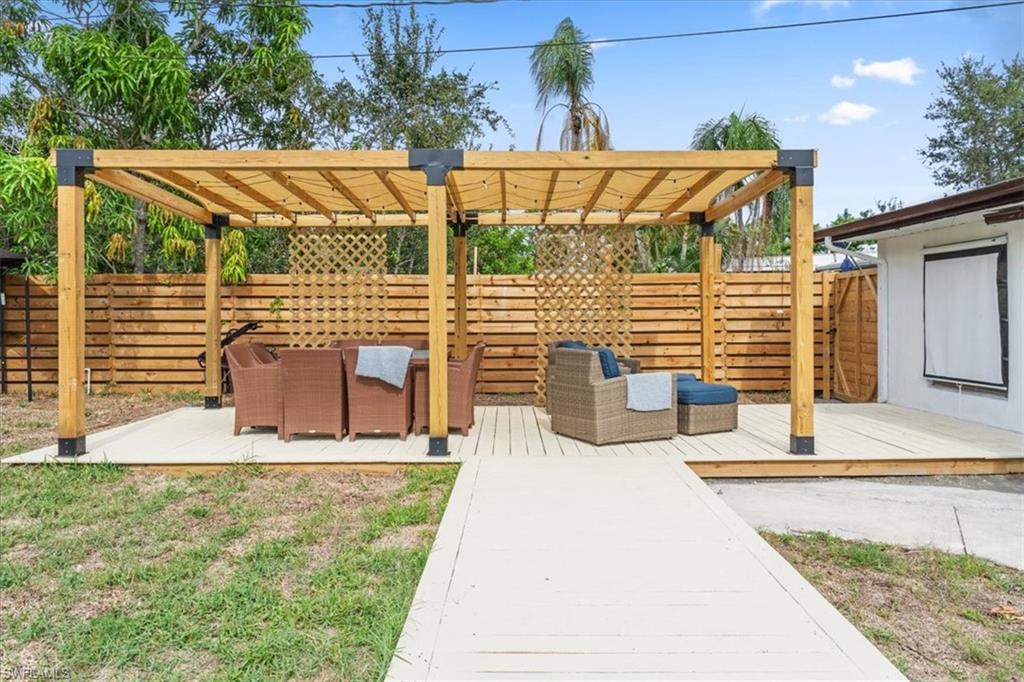 3999 Guava Drive Naples, FL 34104 - Photo 20 of 24 a view of outdoor space with seating area