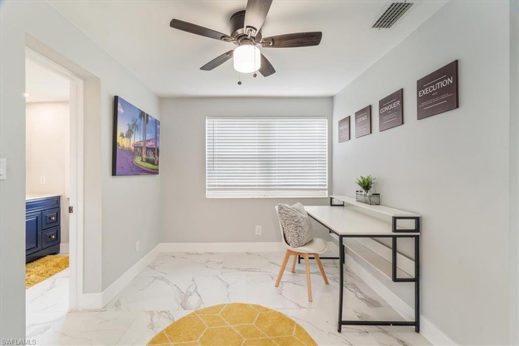 3999 Guava Drive Naples, FL 34104 - Photo 9 of 24 a workspace with furniture and window