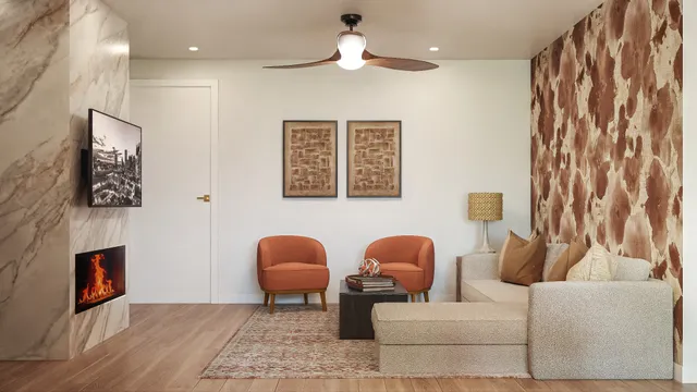 a living room with furniture and a fireplace