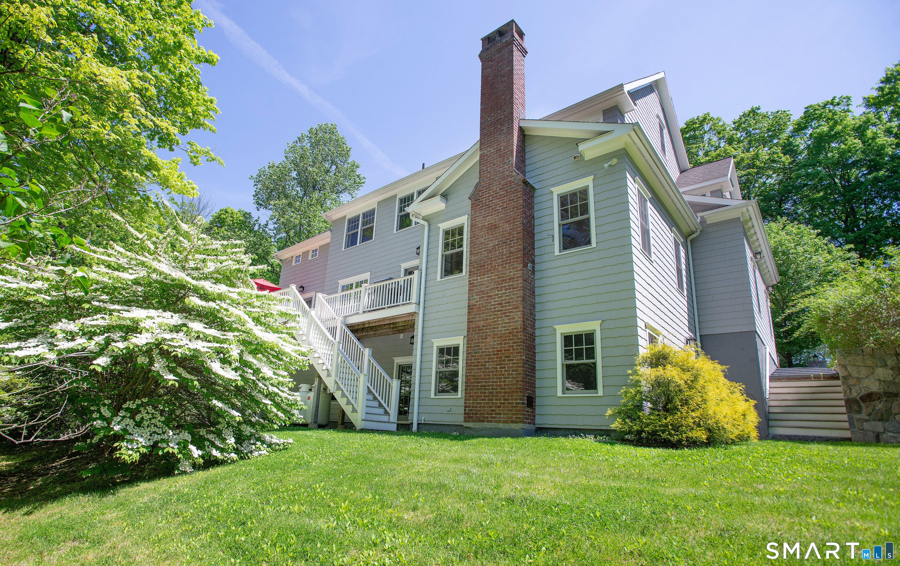 1 Spectacle Lane Ridgefield, CT 06877 - Photo 23 of 31 a front view of a house with garden