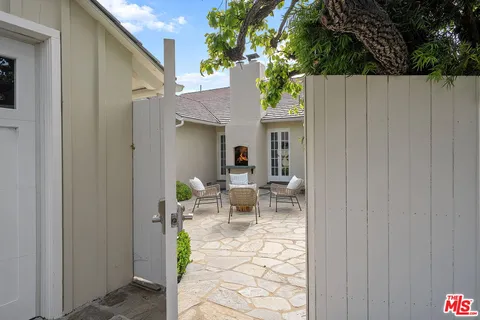 a view of a back yard of the house
