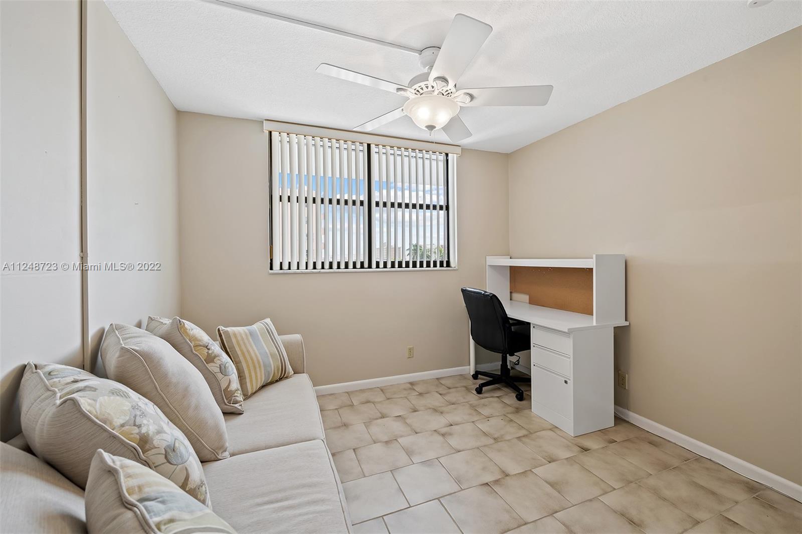 1401 North Riverside Drive, Unit 503 Pompano Beach, FL 33062 - Photo 24 of 30 a view of a livingroom with furniture and a window