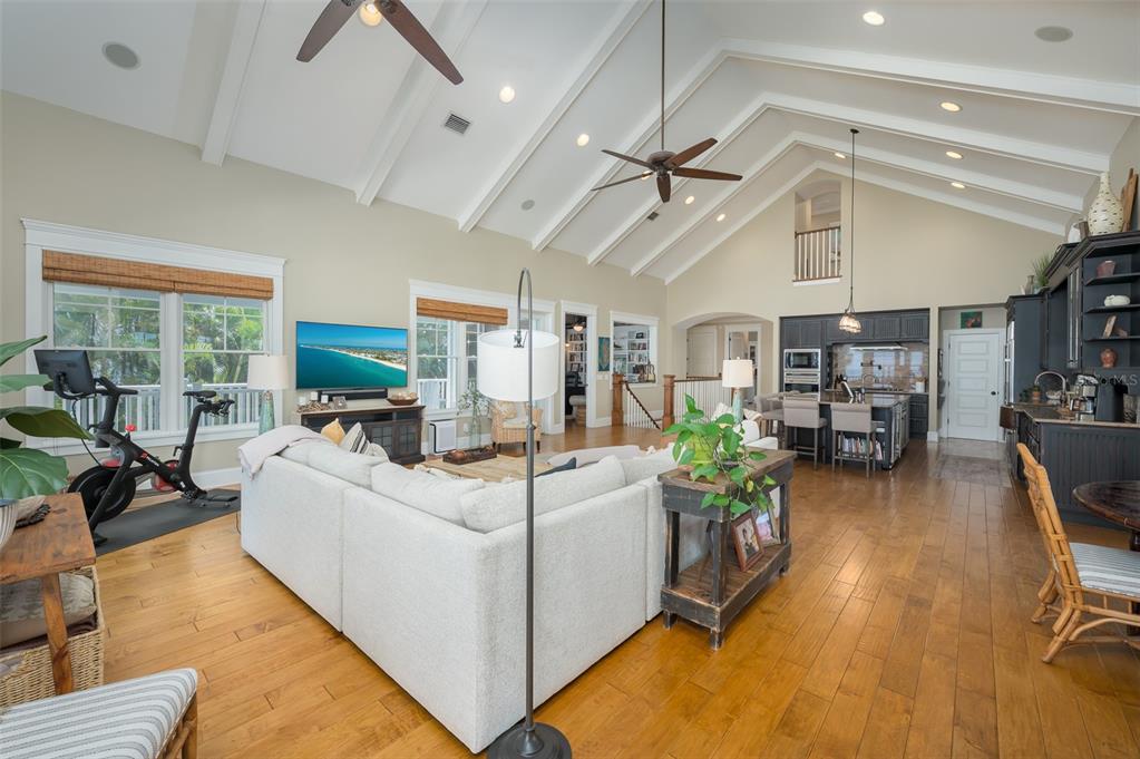 526 56th Street Holmes Beach, FL 34217 - Photo 23 of 99 a living room with furniture and a large window