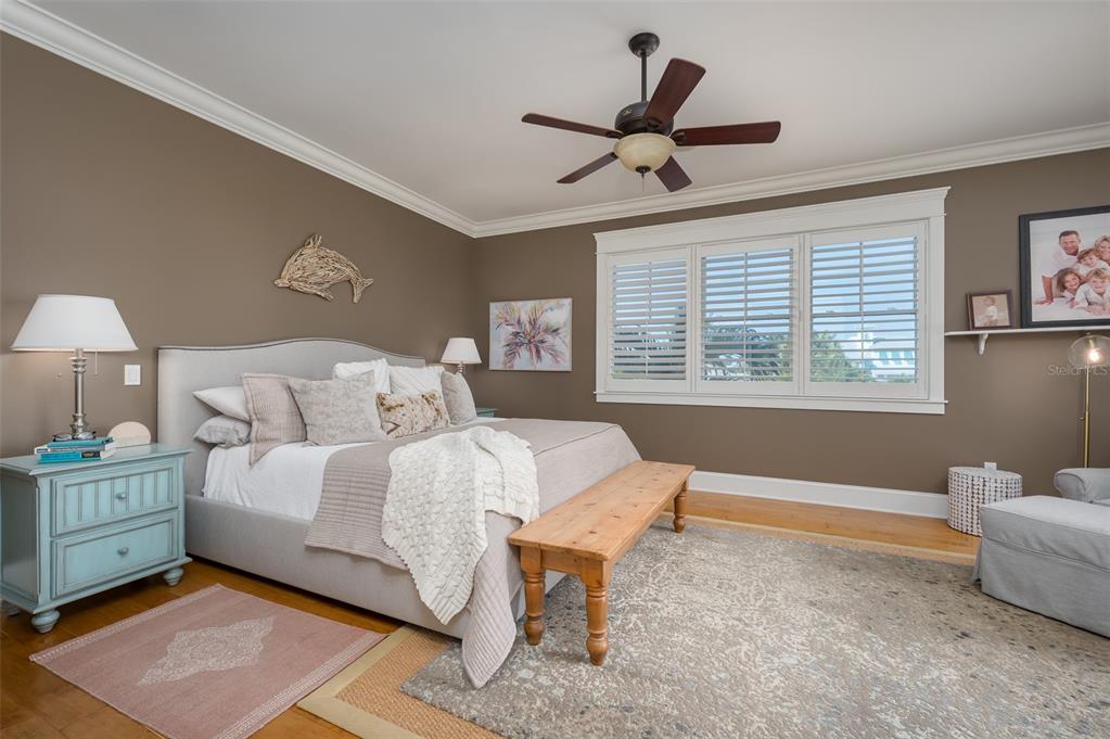 526 56th Street Holmes Beach, FL 34217 - Photo 33 of 99 a bed room with a bed and a window