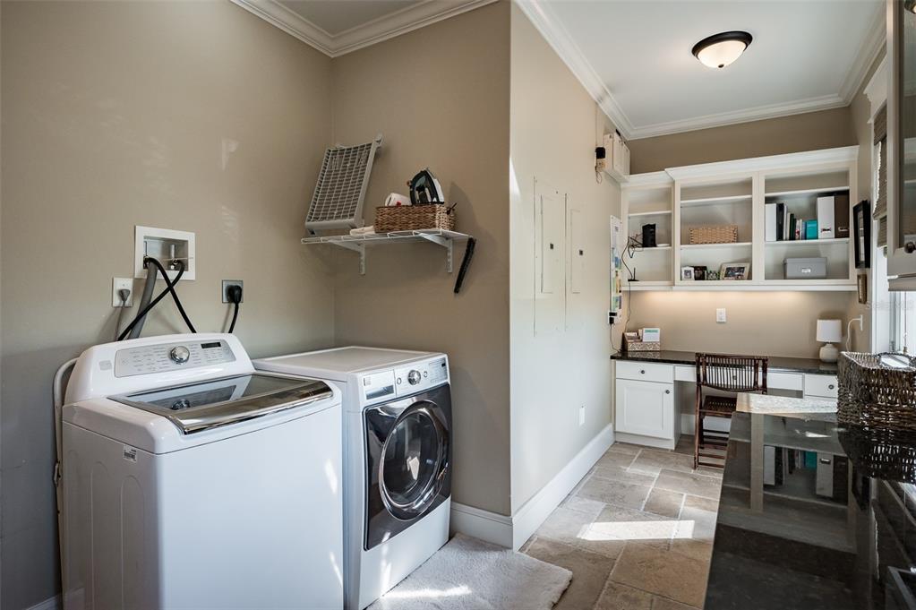 526 56th Street Holmes Beach, FL 34217 - Photo 55 of 99 a utility room with dryer and washer