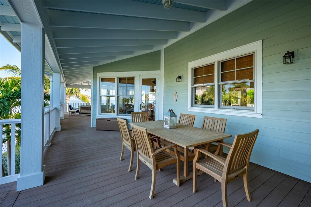 526 56th Street Holmes Beach, FL 34217 - Photo 81 of 99 a dining room with furniture and window