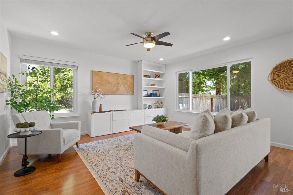 1194 Halyard Drive Santa Rosa, CA 95401 - Photo 6 of 50 Light-filled living room offering flexible space for gathering, relaxing, or entertaining.