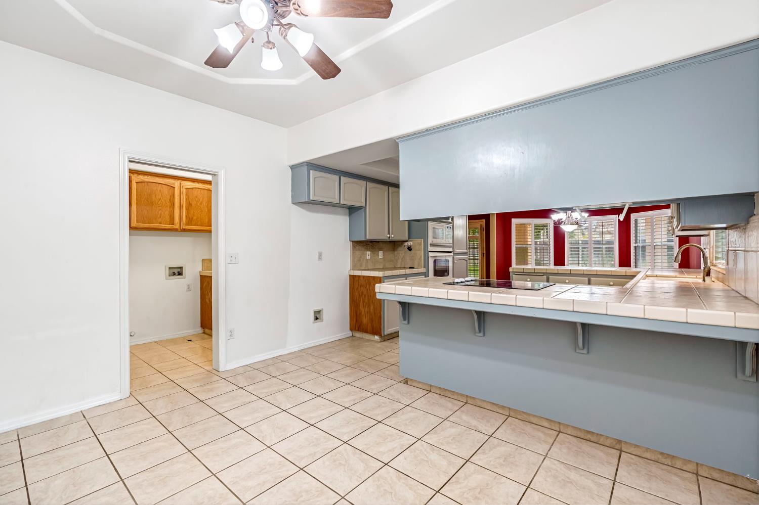 3410 Doubletree Way Madera, CA 93637 - Photo 20 of 34 a kitchen with stainless steel appliances a sink and cabinets