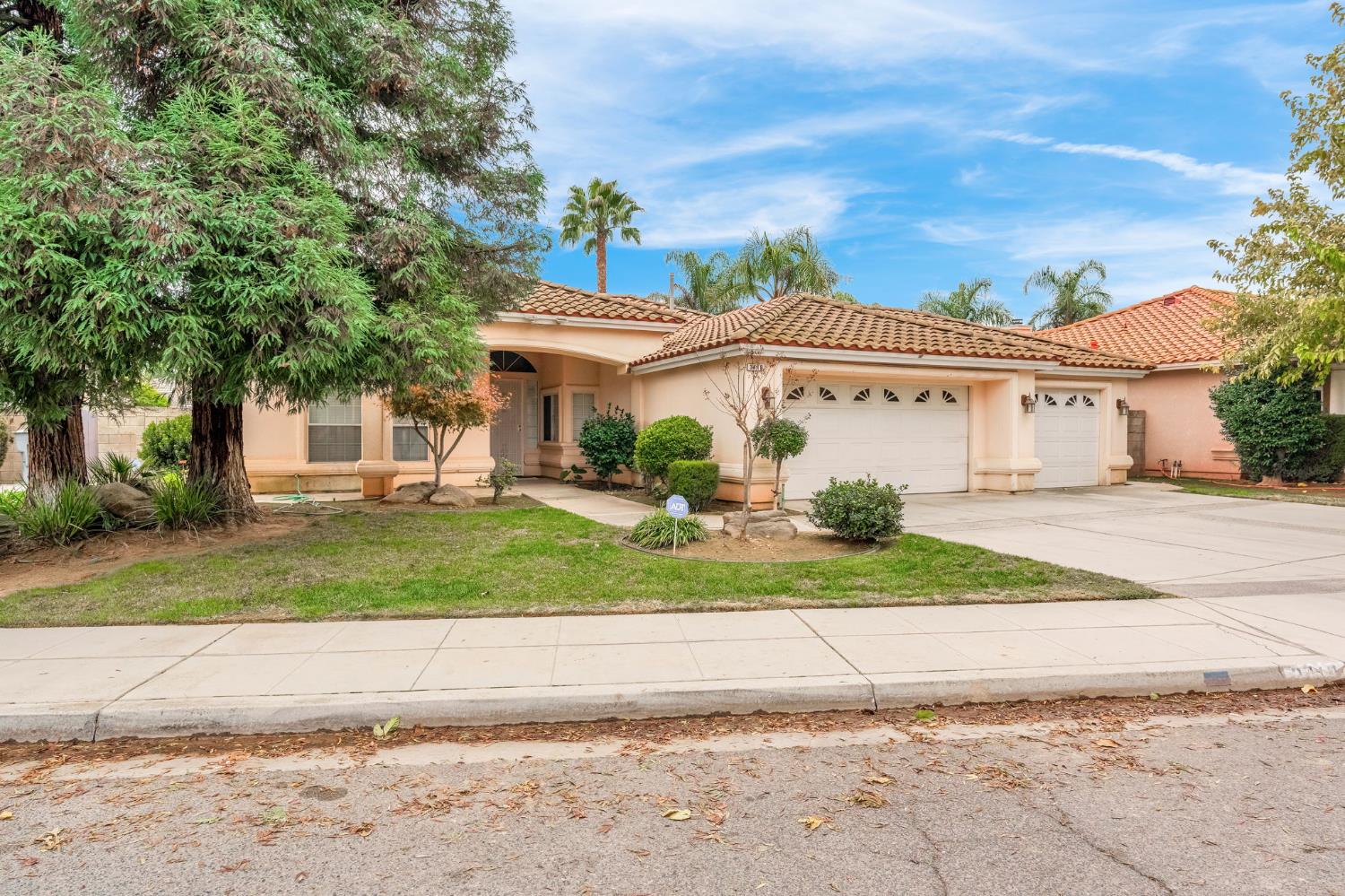 3410 Doubletree Way Madera, CA 93637 - Photo 2 of 34 a view of white house with a yard
